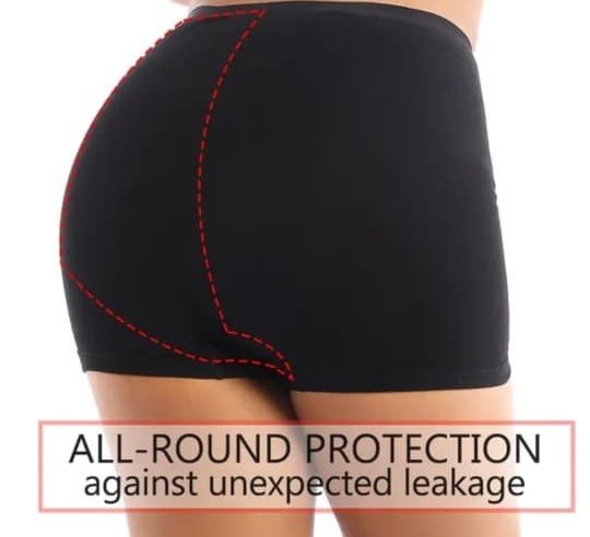 Smiling with confidence wearing InclusiFit underwear