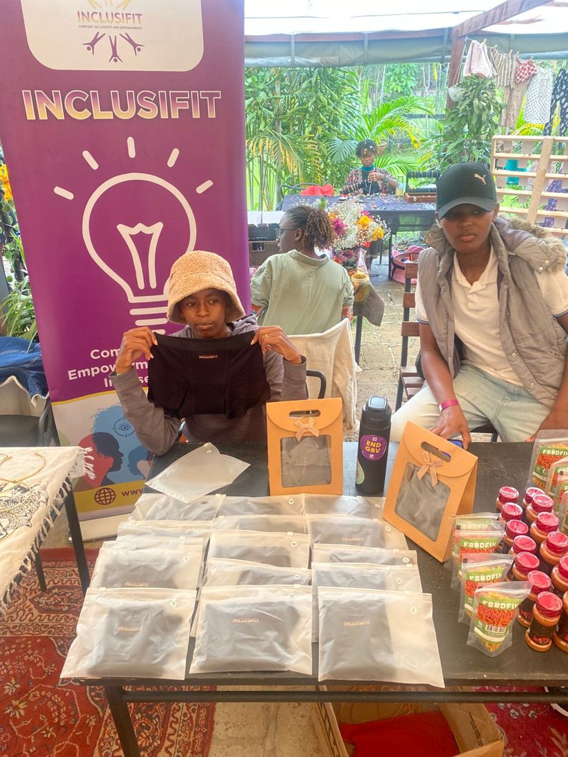 InclusiFit booth displaying inclusive menstrual health products.